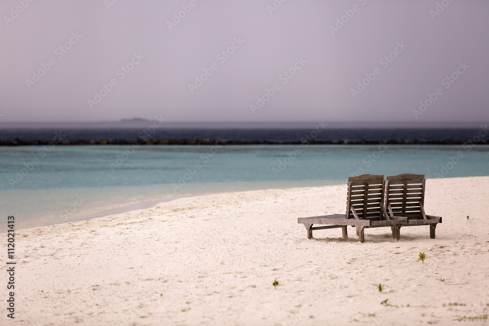 beach chairs on the tropical sand beach
