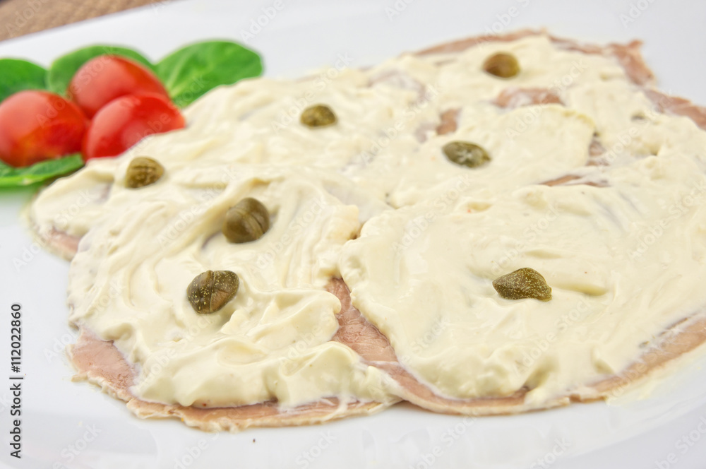 Vitello tonnato - slices of veal with tuna sauce and capers Vitello tonnato - slices of veal with tuna sauce and capers
