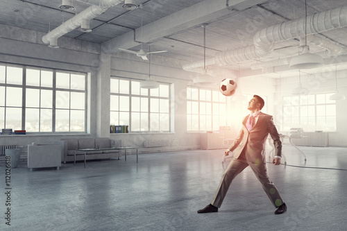 Playing football in office