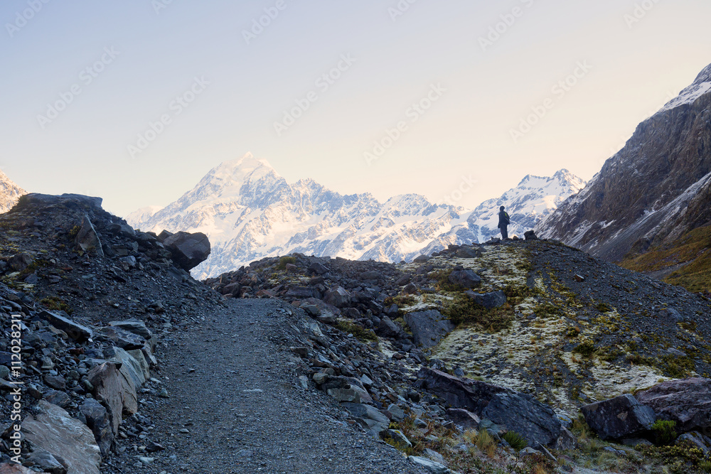 Hiker enjoying the scenery in Mount Cook National Park.