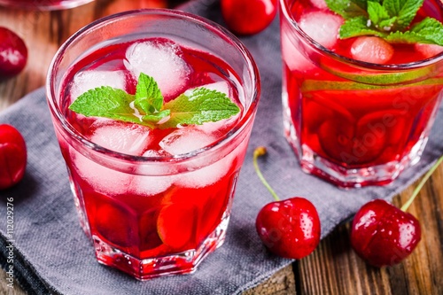 Wallpaper Mural cherry lemonade with ice and mint in glasses Torontodigital.ca