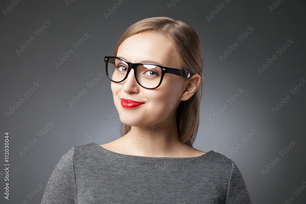 beautiful young woman with red lips in glasses