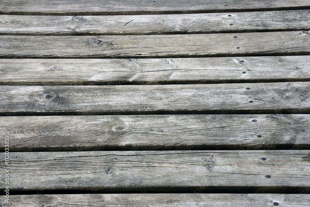 Weathered old wooden boards background. Weathered old wooden boards background.