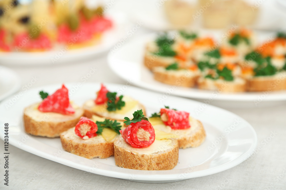 Set of cold snacks and canape, closeup Set of cold snacks and canape, closeup