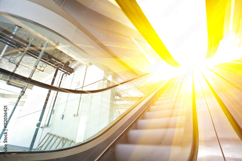 Obraz premium office building interior escalators and stairs
