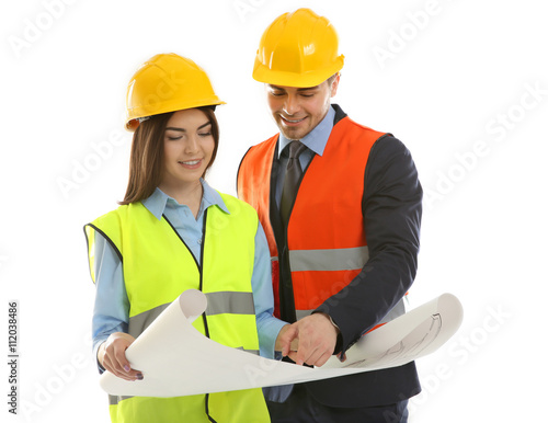 Man and woman in vests with...