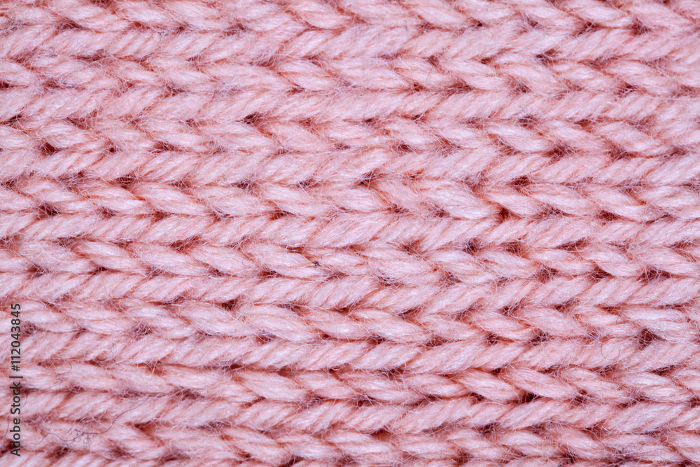 Pink knitted fabric background