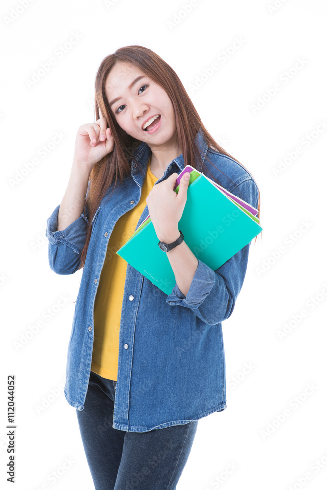 Young asian student girl with book. Isolated on white background Young asian student girl with book. Isolated on white background