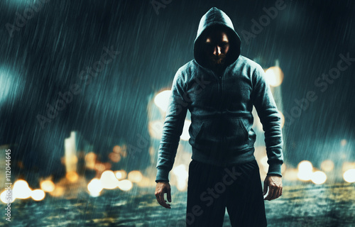 Man with hoodie on the street photo