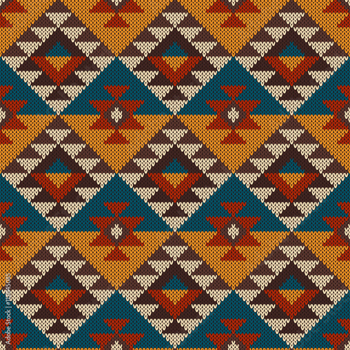 Traditional Tribal Aztec Seamless Pattern on the Wool Knitted Te