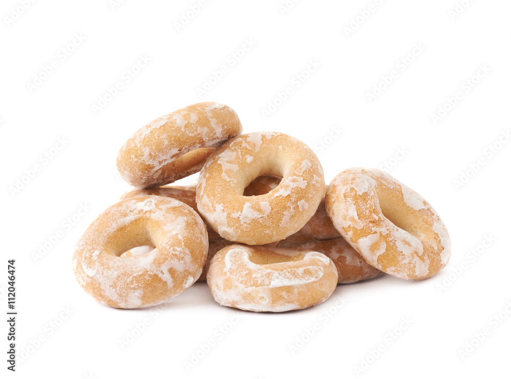 Pile of small cakes with hole isolated over the white background Pile of small cakes with hole isolated over the white background
