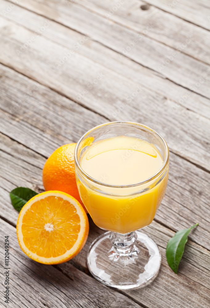Fresh ripe oranges and juice Fresh ripe oranges and juice