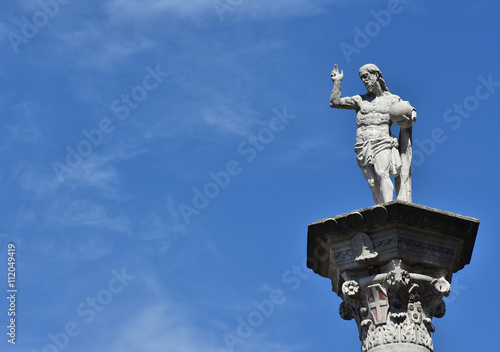Statue of Christ the Redeemer at the top of a column in the center of Vicenza
