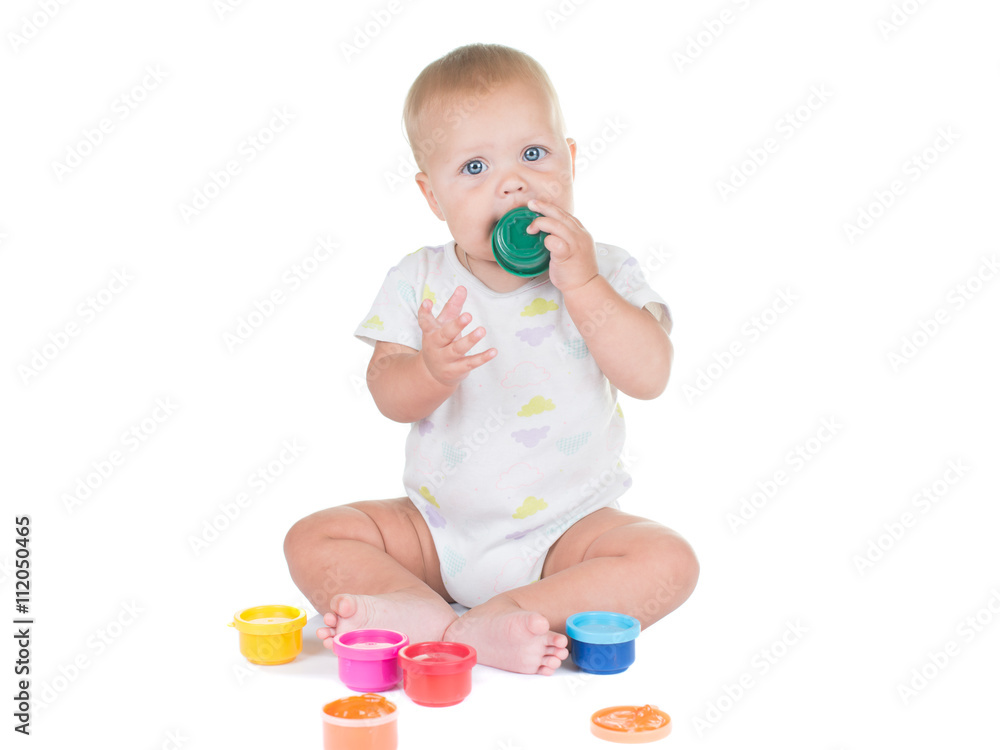 Cute little redhead girl painting with brush. Isolated on white background Cute little redhead girl painting with brush. Isolated on white background