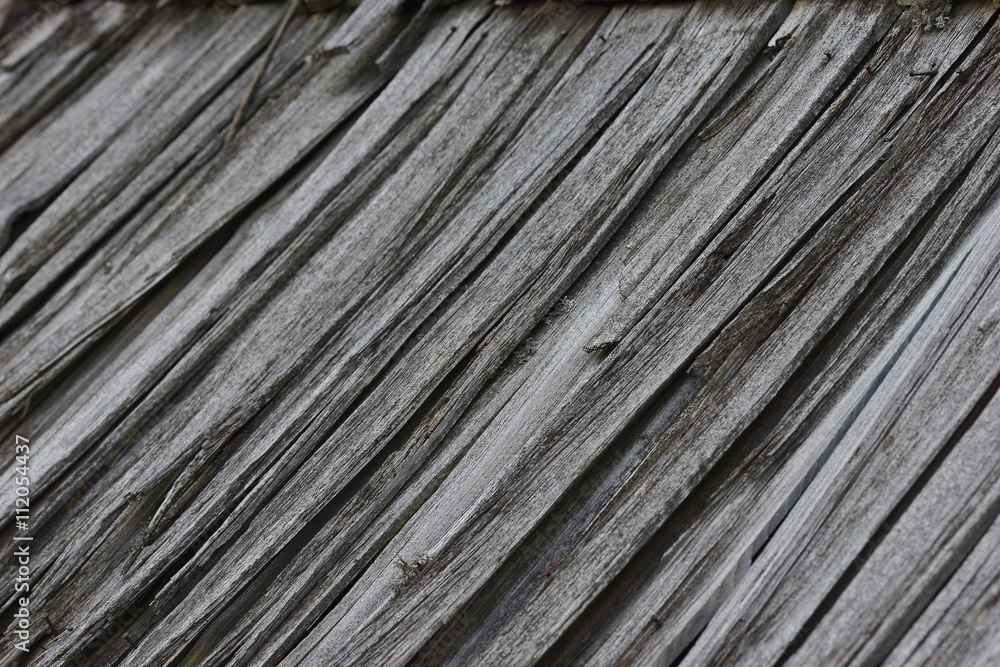 Obsolete wood planks from an old house roof Obsolete wood planks from an old house roof