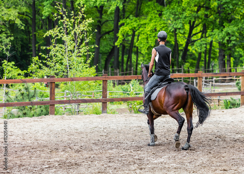 male athlete rides on horse © Olexandr