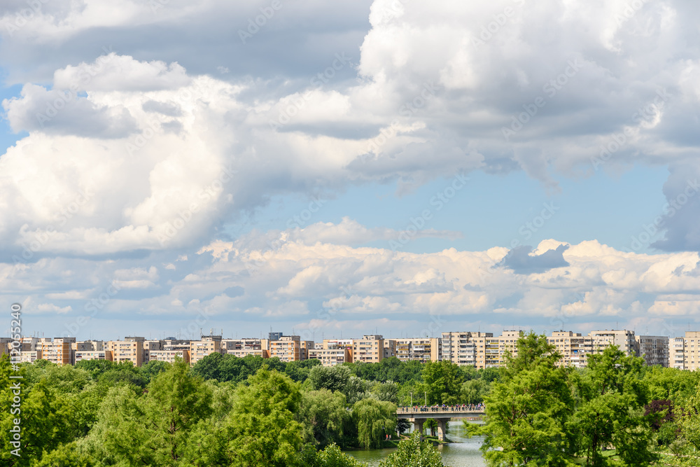Bucharest City Skyline View From Youths Park (Parcul Tineretului) With Blue Sky And White Clouds Bucharest City Skyline View From Youths Park (Parcul Tineretului) With Blue Sky And White Clouds