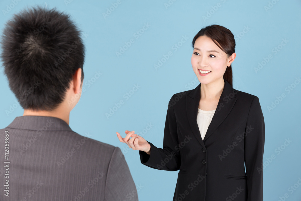 portrait of asian businesswoman isolated on blue background portrait of asian businesswoman isolated on blue background