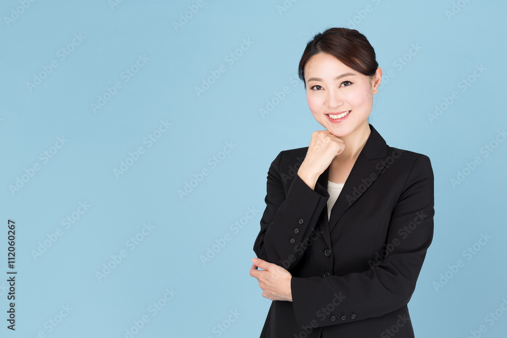 portrait of asian businesswoman isolated on blue background portrait of asian businesswoman isolated on blue background