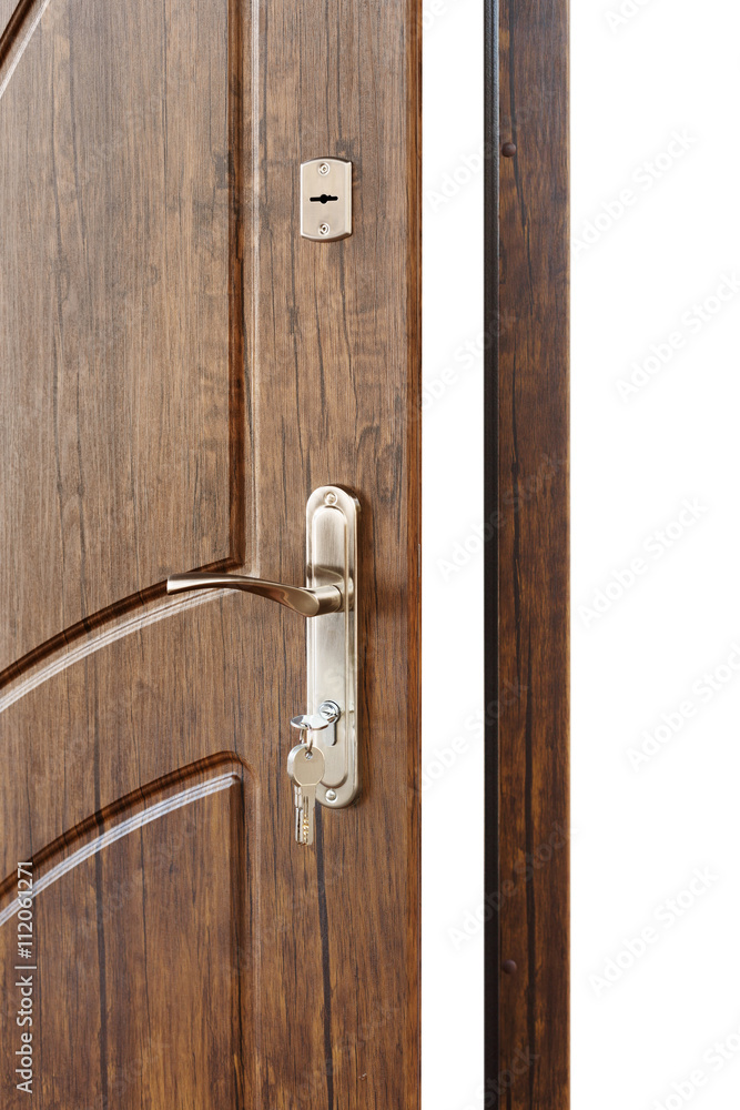 Open brown wooden door handle with lock. Open brown wooden door handle with lock.