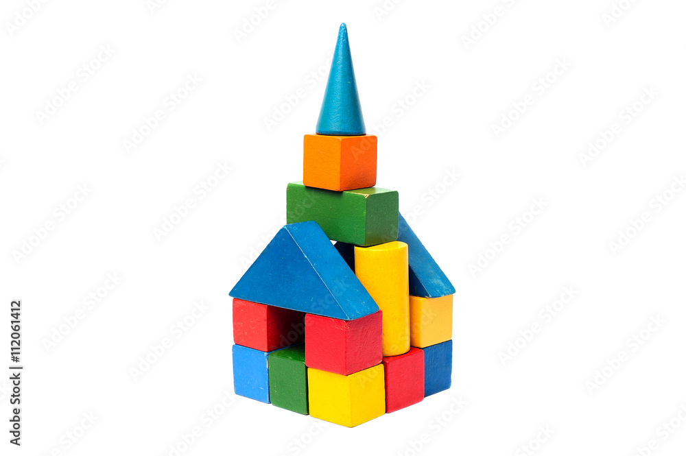 House made of old cubes. Wooden colorful building blocks isolated on white background. Vintage childrens toys. House made of old cubes. Wooden colorful building blocks isolated on white background. Vintage childrens toys.