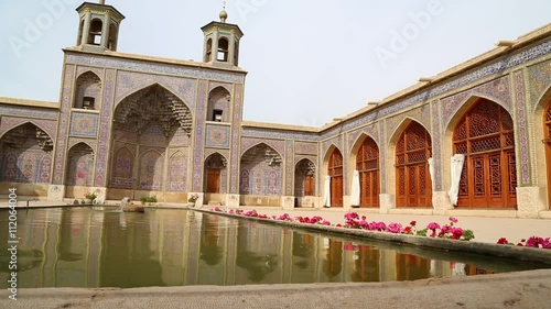 in iran fountain and old antique mosque flower and plant persian architecture photo