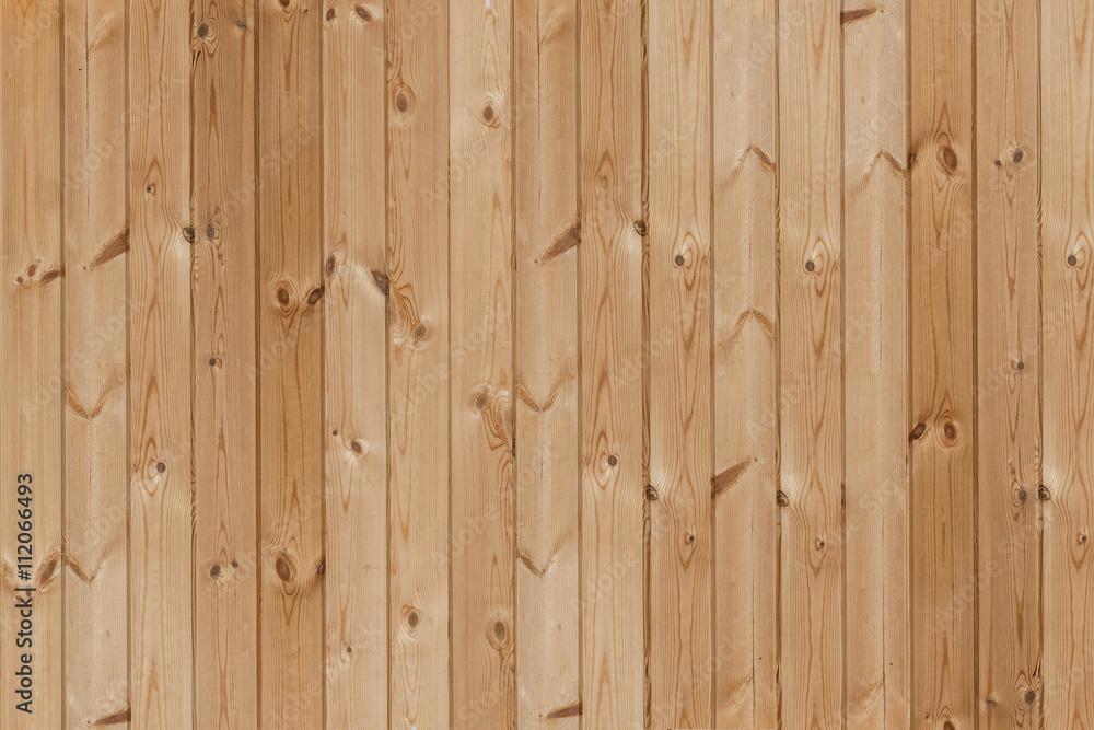 Wooden background of boards arranged vertically in the frame. Wooden background of boards arranged vertically in the frame.