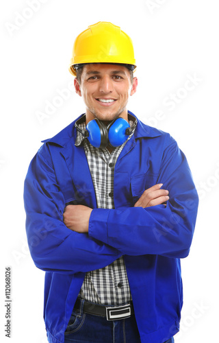 Young engineer in helmet is...