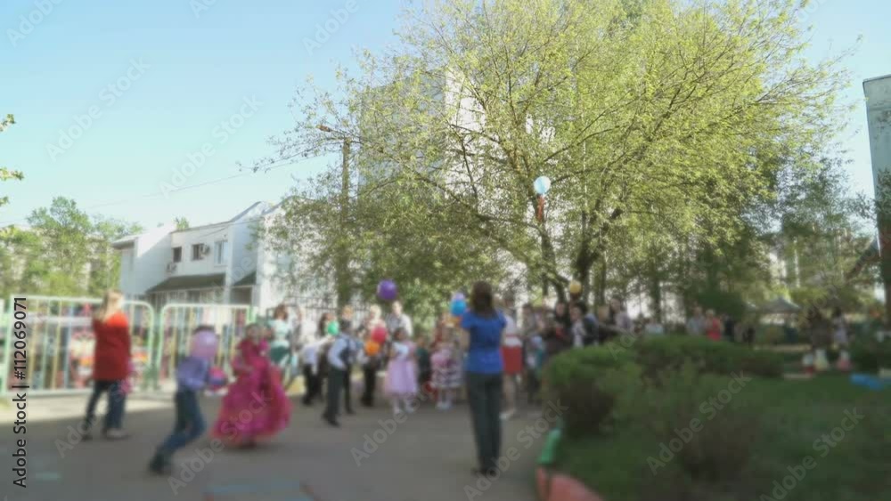 Children release colorful balloons into the sky Children release colorful balloons into the sky