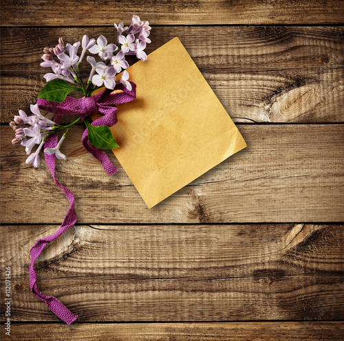 Paper tag with bow and lila...