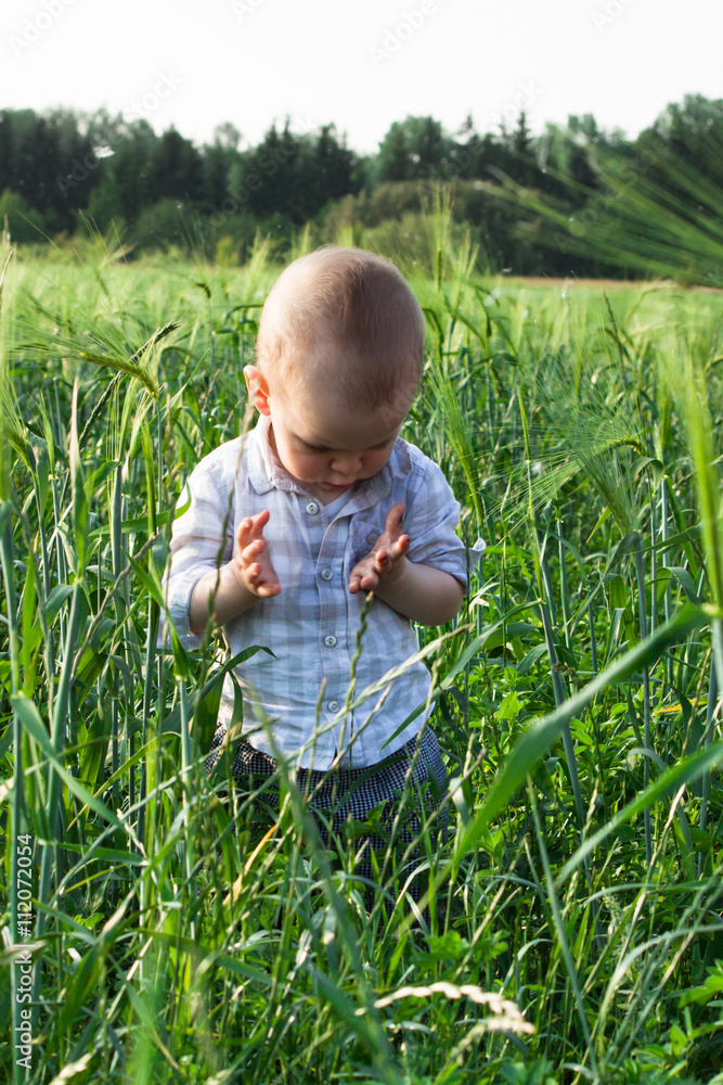 Child playing in nature. Child playing in nature.