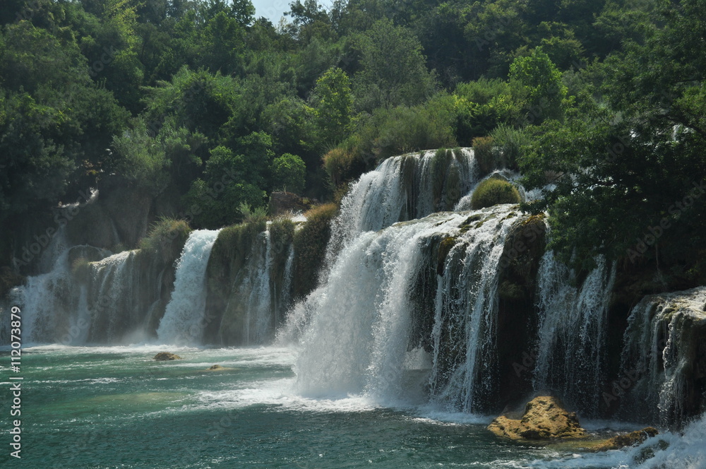 Fototapeta premium Waterfalls in Krka National Park in Croatia. Strength and picturesque miracle of nature