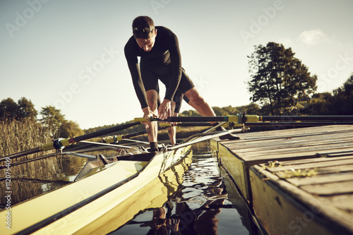 Young man at canoe