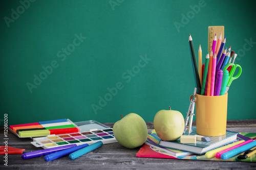 school stationary on wooden table