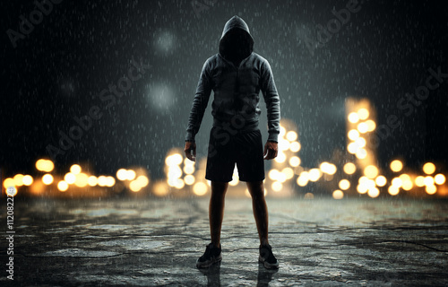 Man with hoodie on the street 