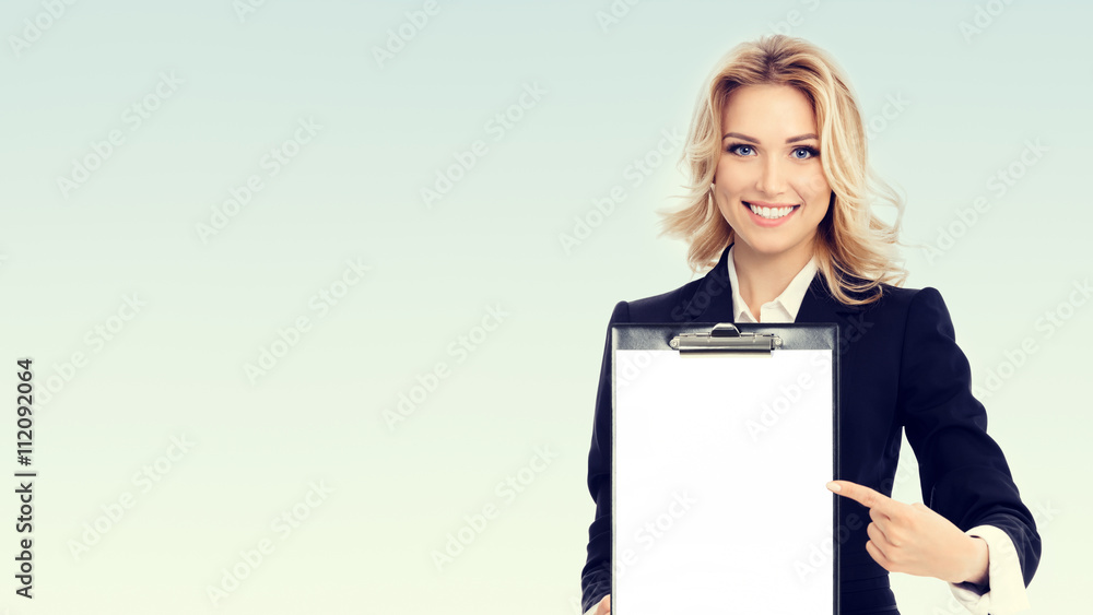young businesswoman showing blank clipboard young businesswoman showing blank clipboard