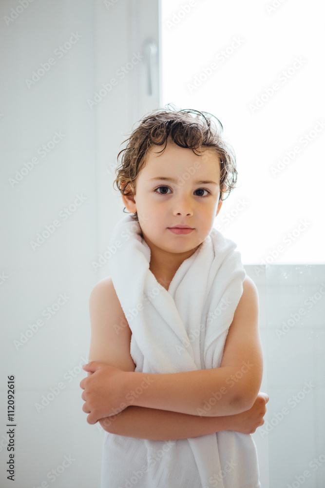Adorable little boy with white towel Adorable little boy with white towel