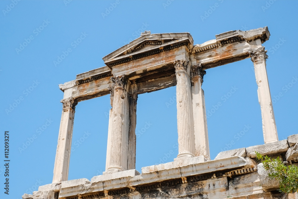 Looking up view of famous Greek temple pillars against clear blue sky in Temple of Zeus, Greece