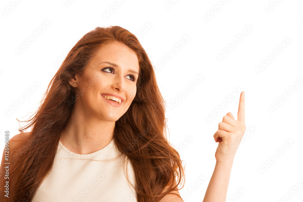 Business woman pointing to copy space while presenting a product Business woman pointing to copy space while presenting a product