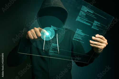 Hooded computer hacker hacking biometric security internet syste photo