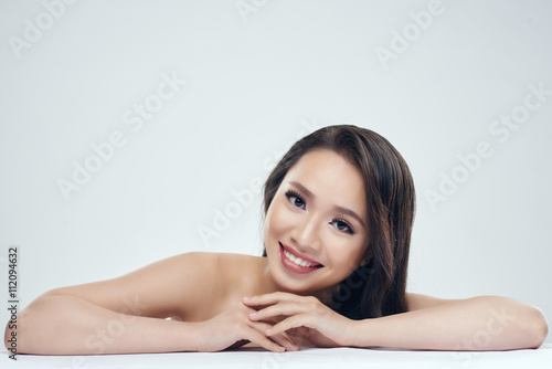 Portrait of smiling lovely Vietnamese young girl