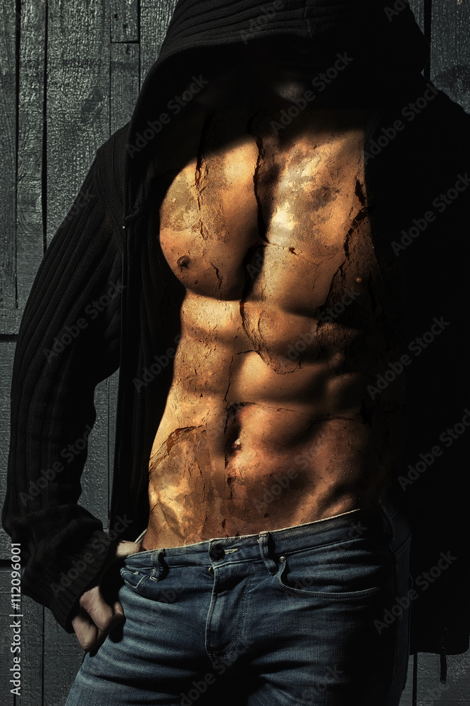 Double exposure on male torso and concrete wall Double exposure on male torso and concrete wall
