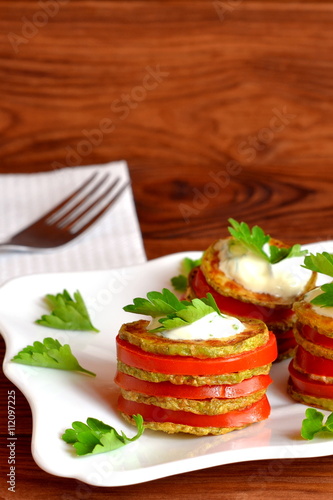 Wallpaper Mural Grilled zucchini with chopped fresh tomatoes, yoghurt and green parsley. Squash vegetarian recipes. Easy summer appetizer. Simple snacking for summer. Delicious vegetable food. Closeup Torontodigital.ca