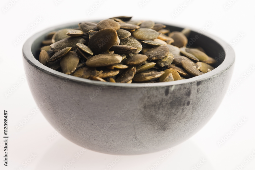pumpkin seeds isolated on white background pumpkin seeds isolated on white background
