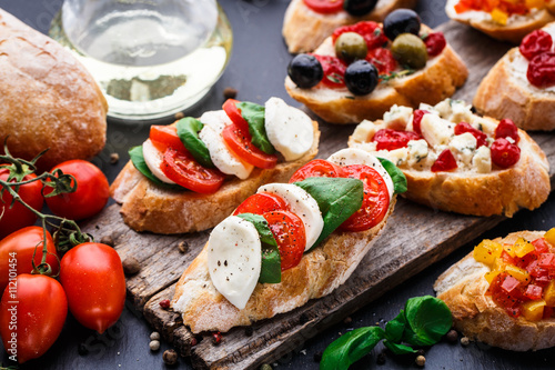Bruschetta with tomatoes, mozzarella and basil