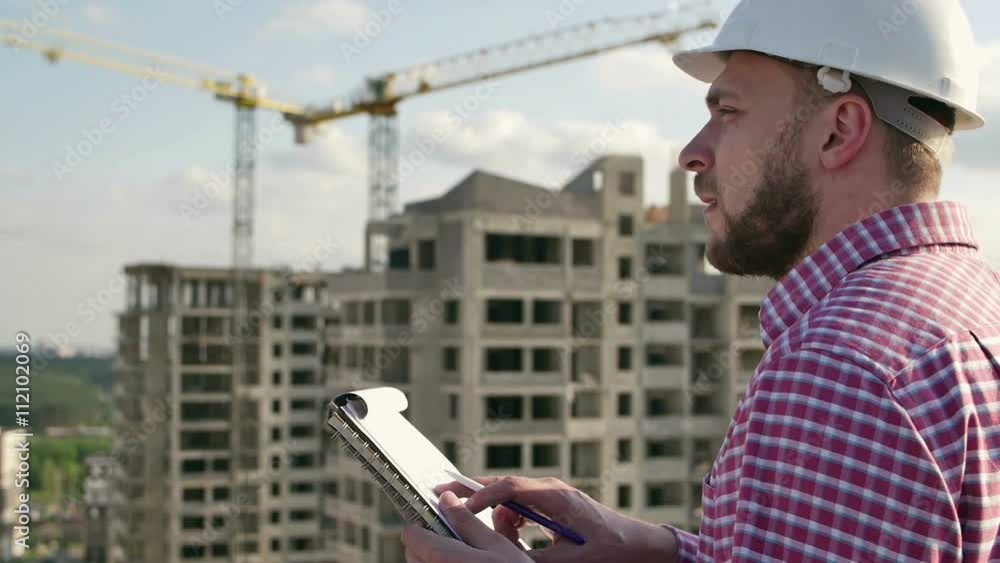 engineer looking on project on construction site engineer looking on project on construction site