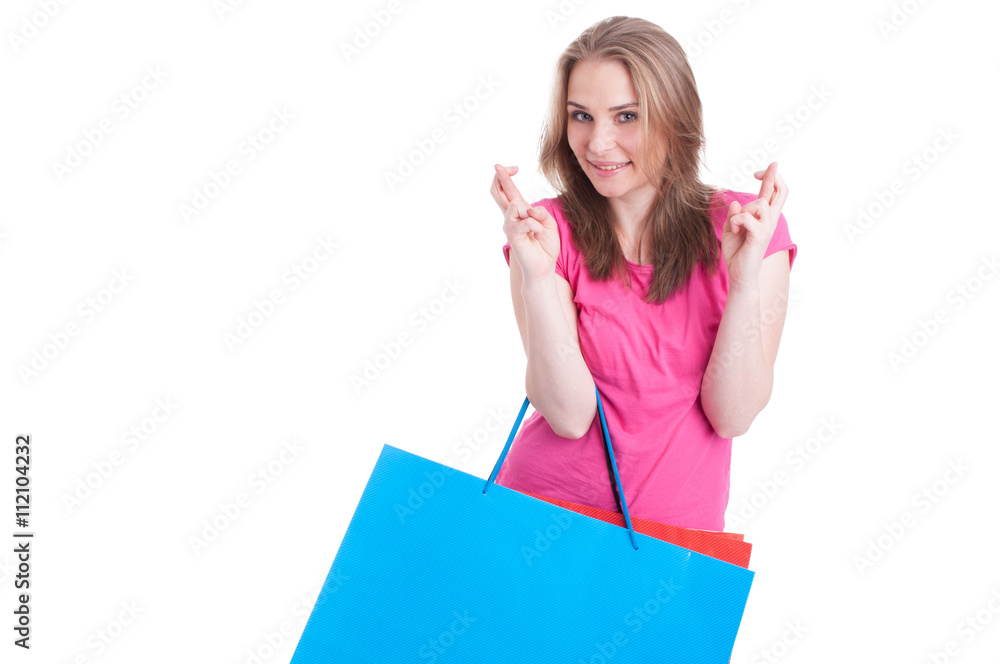 Cheerful woman making wish and luck sign with both hands Cheerful woman making wish and luck sign with both hands