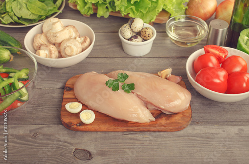 Chicken fillet with ingredients for cooking healthy meals
