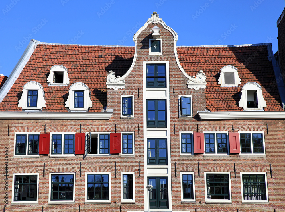 Traditional dutch medieval building in Amsterdam, Netherlands