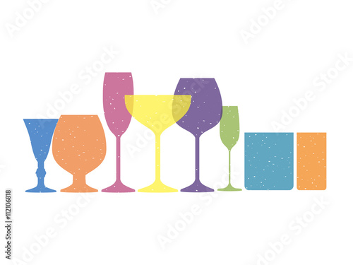 glasses of alcohol of various shapes in pastel colours